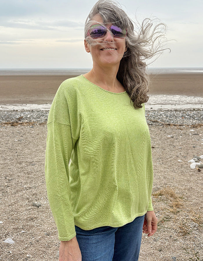relax fit lime green cotton sweater with scoop neckline and high low hemline