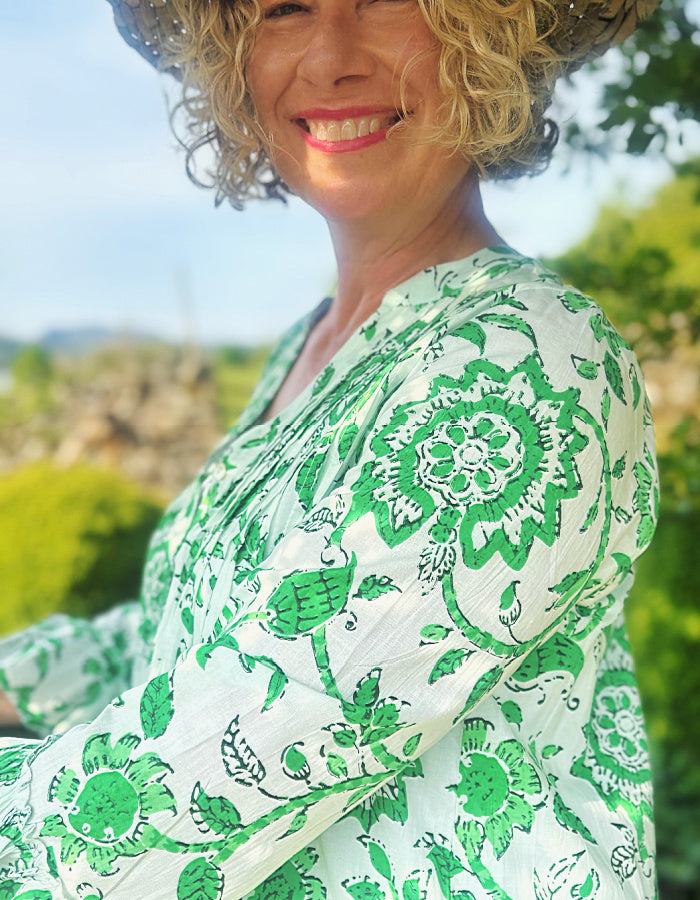 short flared summer dress in green and white floral cotton, perfect over capris or leggings or over a swimsuit