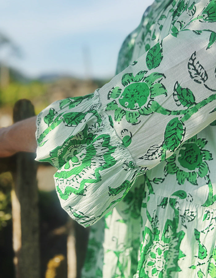 short flared summer dress in green and white floral cotton, perfect over capris or leggings or over a swimsuit
