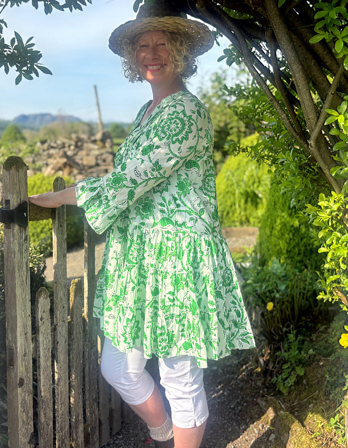 short flared summer dress in green and white floral cotton, perfect over capris or leggings or over a swimsuit