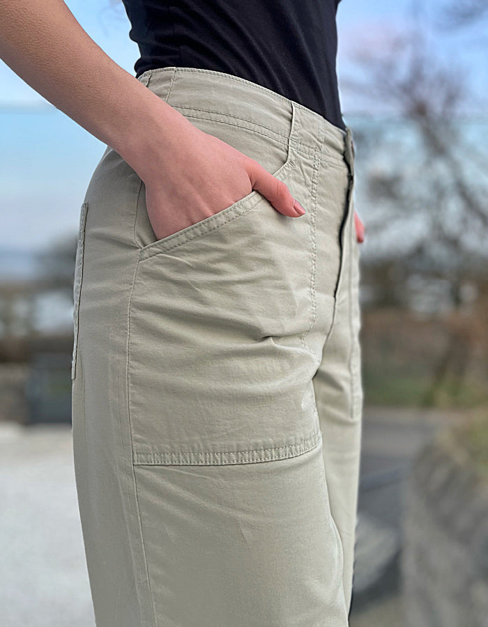 summer cotton twill culotte trousers with a wide leg and front and rear pockets in summer green