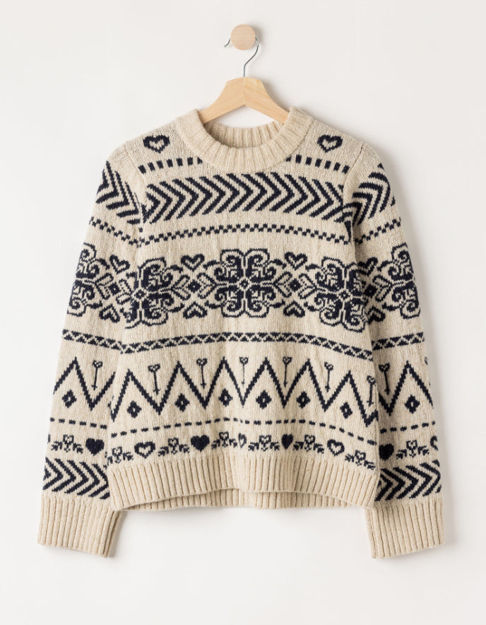 a cream Fairisle patterned scandi sweater on a white background