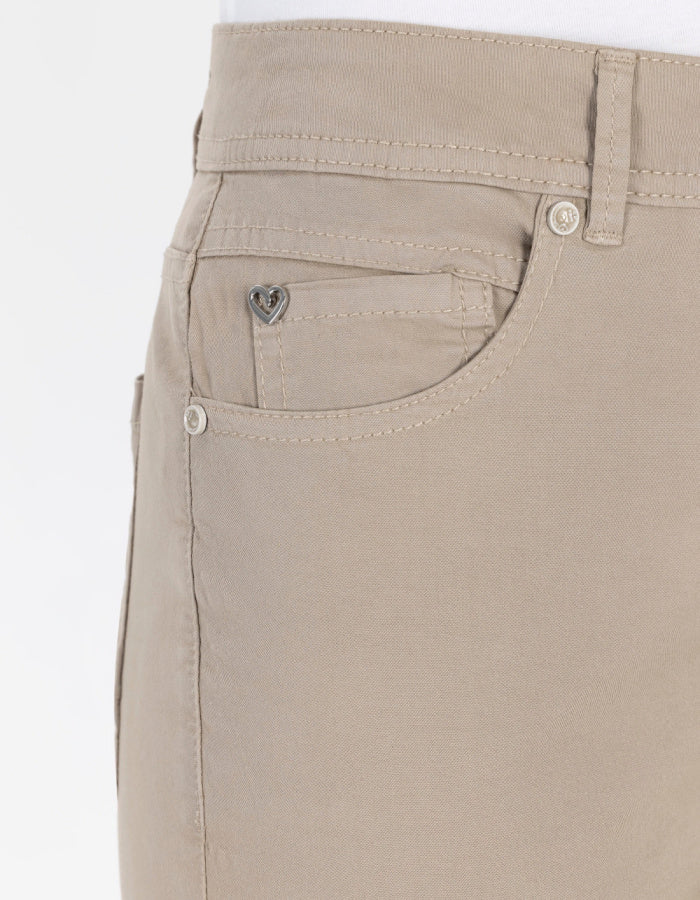sandy coloured neutral cotton straight leg trouser with 5 pockets and button fly closure