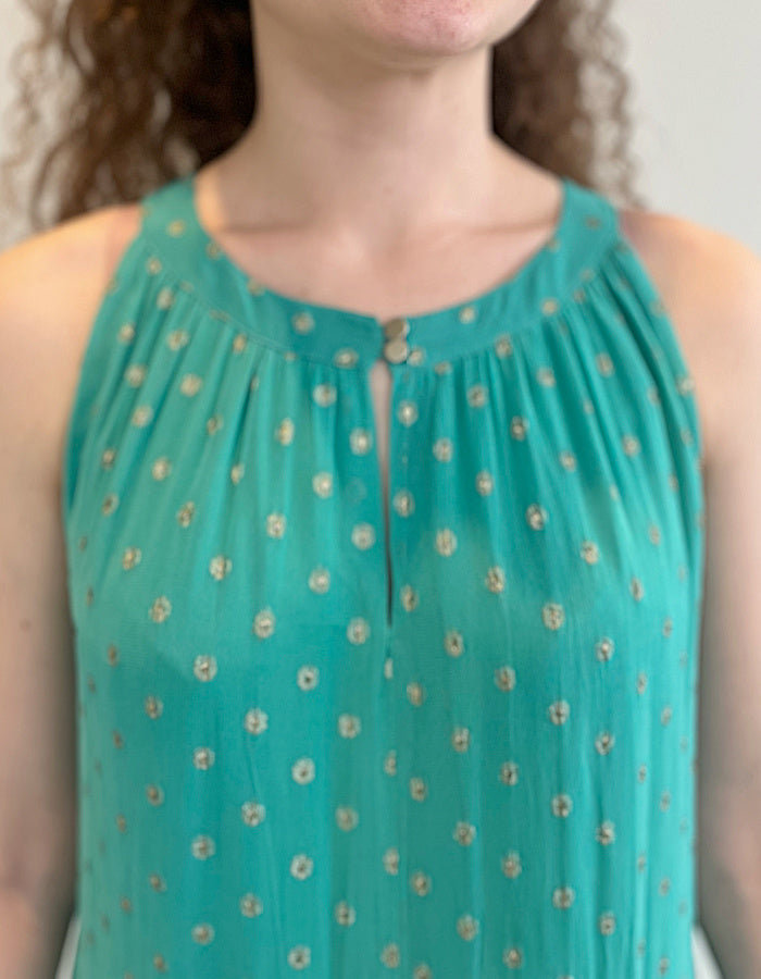 aqua viscose georgette layered maxi dress with halter style sleeveless neckline and gold metallic dots in the fabric