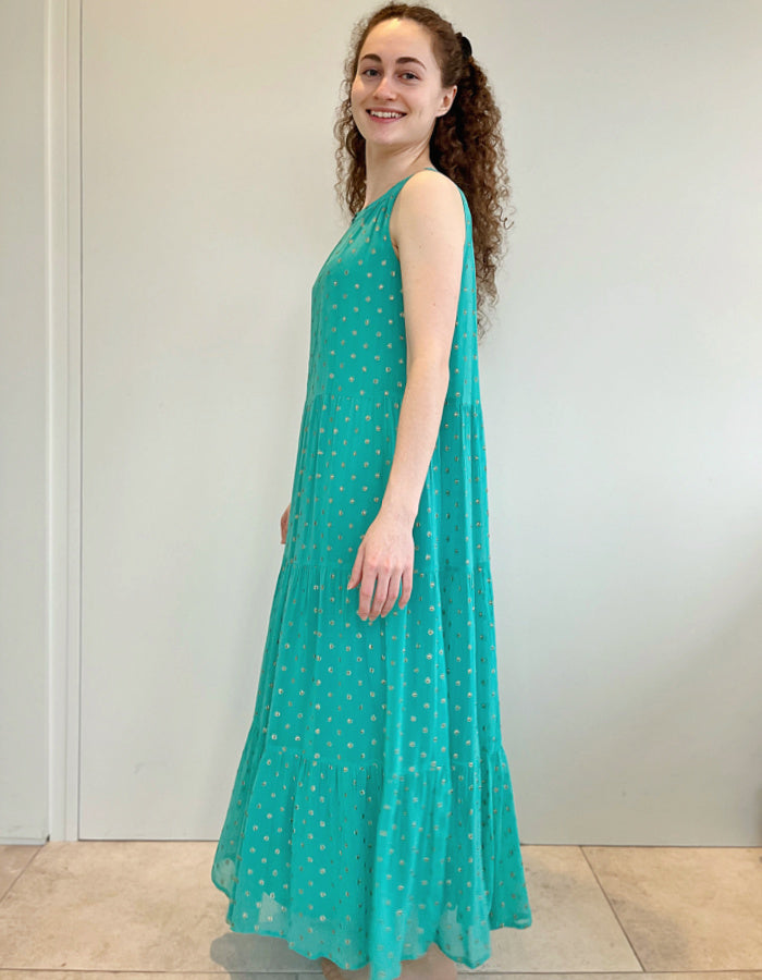 aqua viscose georgette layered maxi dress with halter style sleeveless neckline and gold metallic dots in the fabric