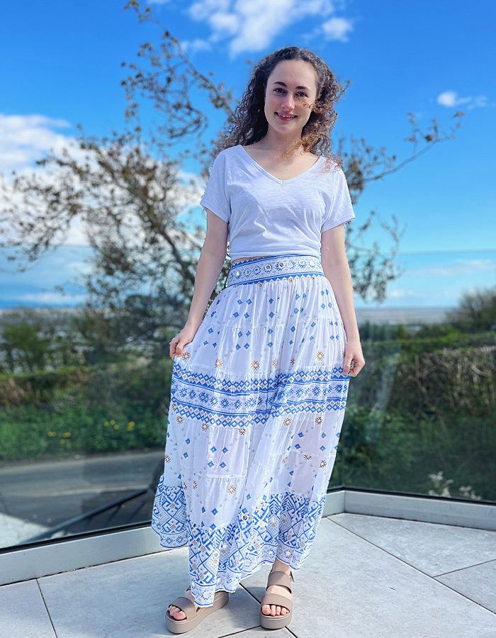 white cotton maxi skirt with blue and gold geo print with mirror details, elasticated waist