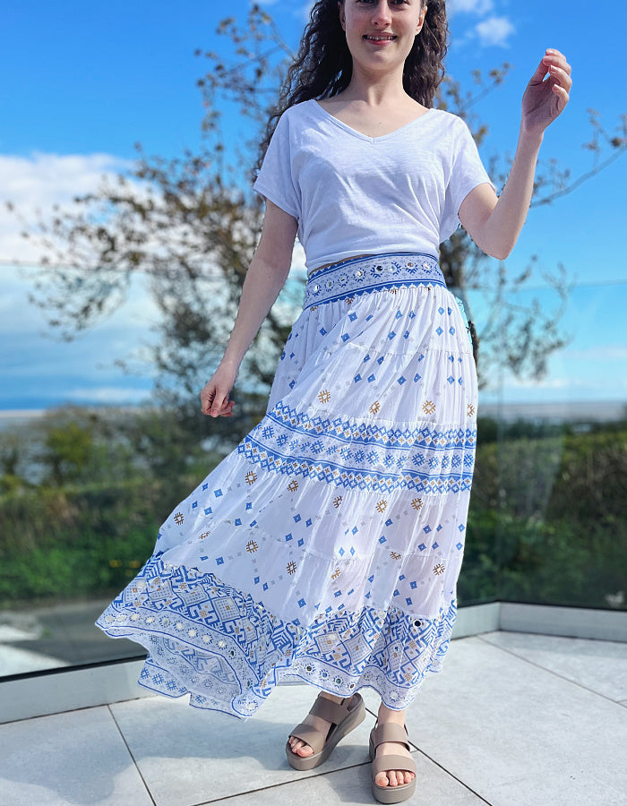 white cotton maxi skirt with blue and gold geo print with mirror details, elasticated waist