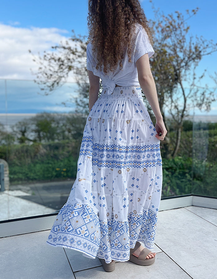 white cotton maxi skirt with blue and gold geo print with mirror details, elasticated waist