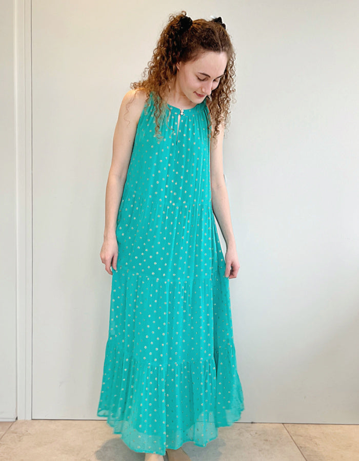 aqua viscose georgette layered maxi dress with halter style sleeveless neckline and gold metallic dots in the fabric