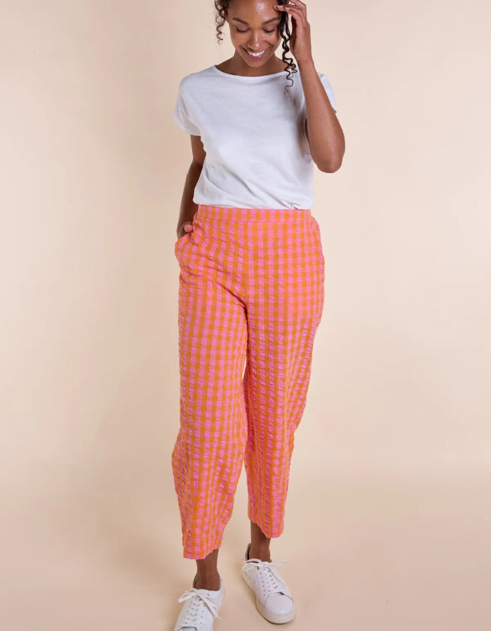 pink and orange lantern shaped cotton summer trousers with elasticated waist and pockets