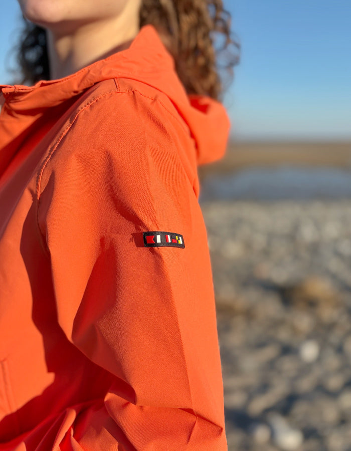 orange short packable rain jacket with hood