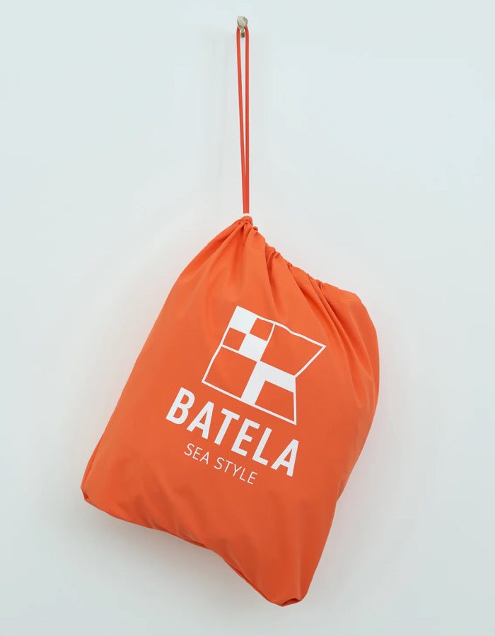 orange short packable rain jacket with hood