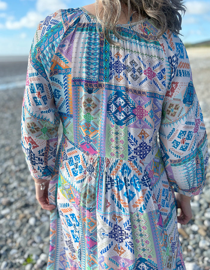 easy style loose fit summer dress with 3/4 length sleeves and a loose flow fit in a soft pastel bright