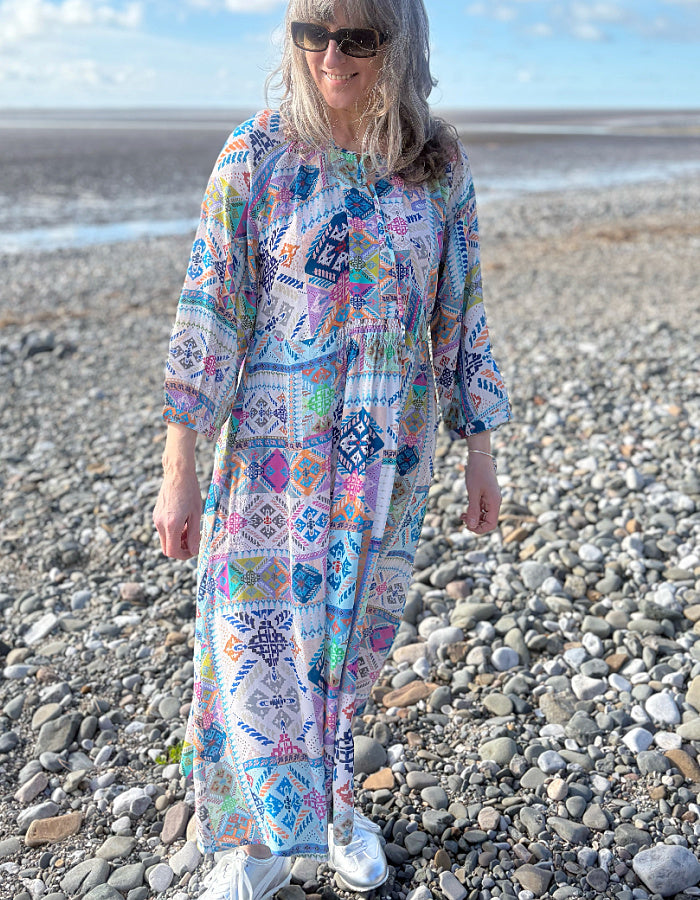easy style loose fit summer dress with 3/4 length sleeves and a loose flow fit in a soft pastel bright