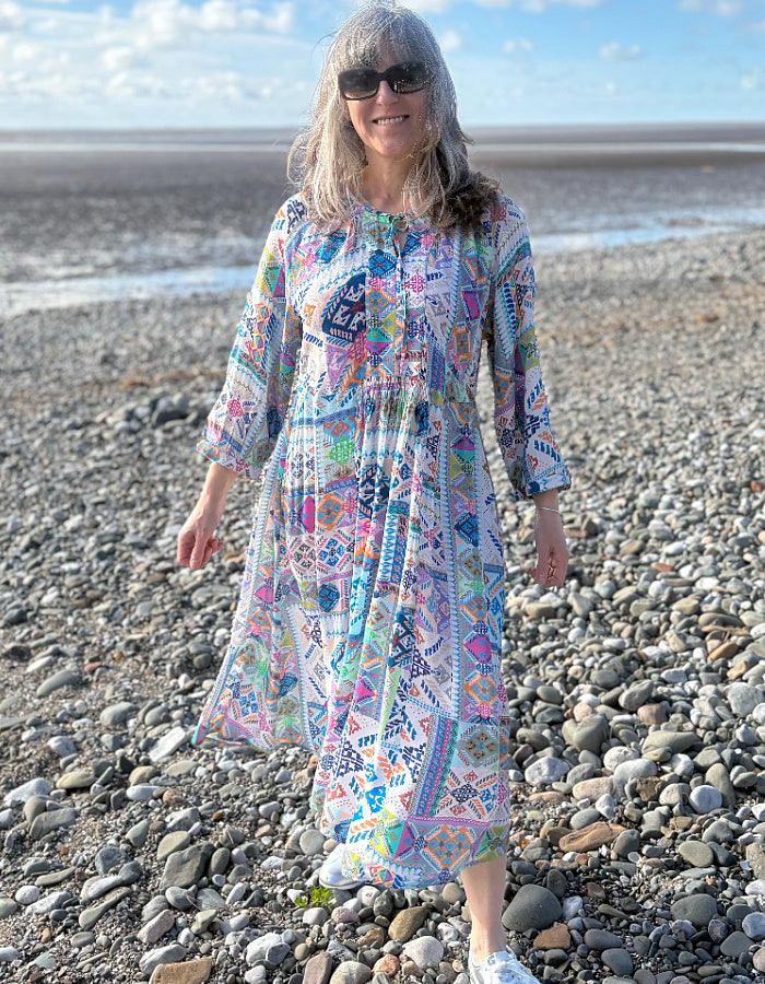 easy style loose fit summer dress with 3/4 length sleeves and a loose flow fit in a soft pastel bright