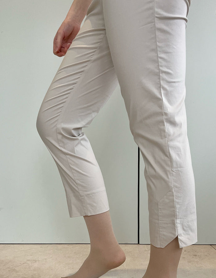 pearl cream trapeze fabric stretch trousers with 7/8ths length with notch split hemline and elasticated waist