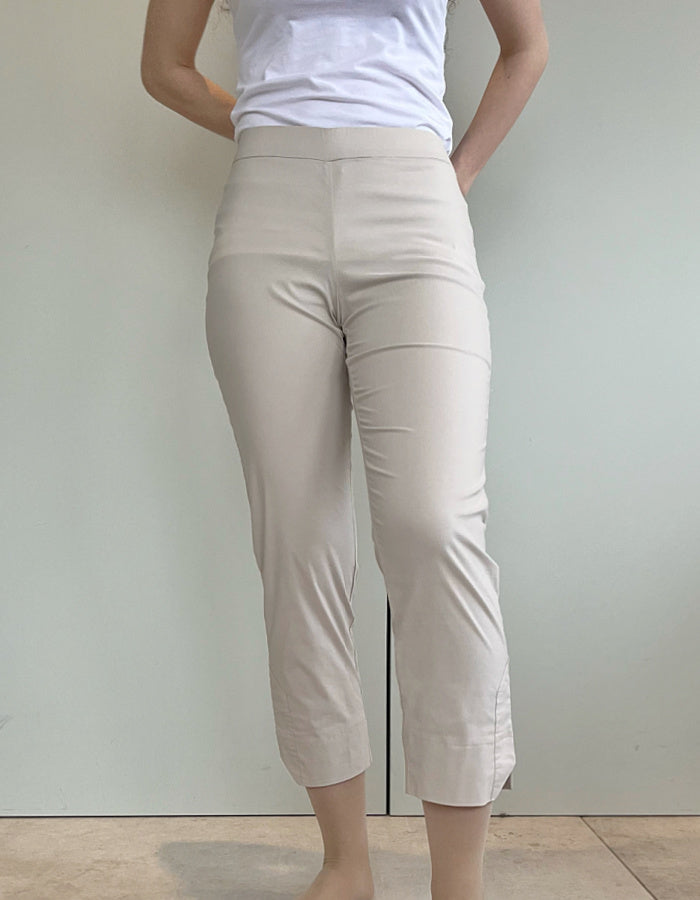 pearl cream trapeze fabric stretch trousers with 7/8ths length with notch split hemline and elasticated waist