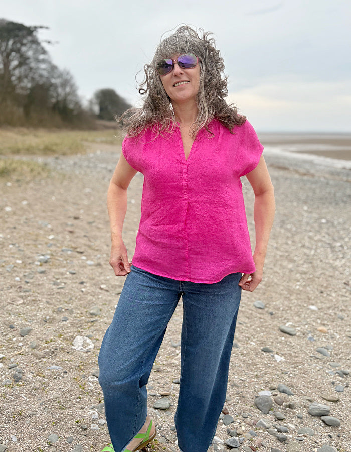 pink v neck linen top with capped sleeves