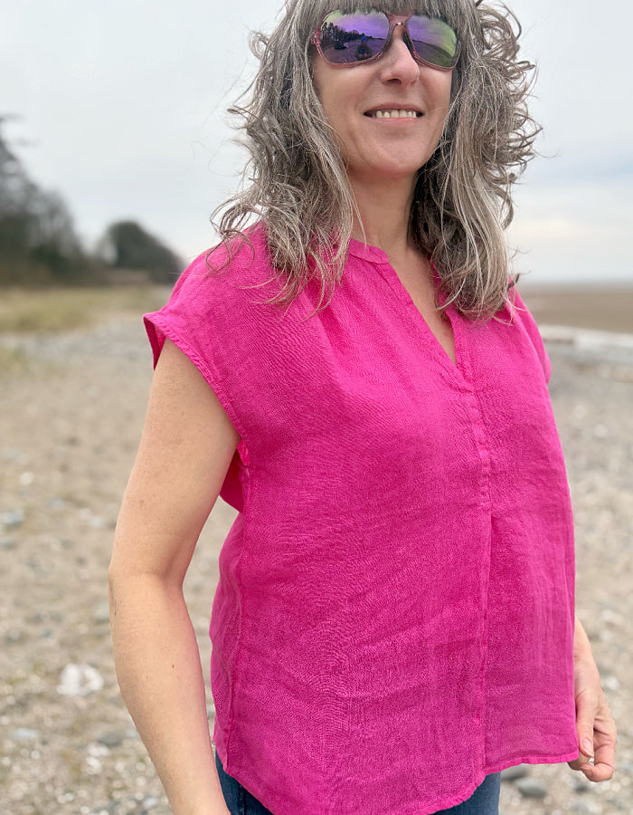pink v neck linen top with capped sleeves