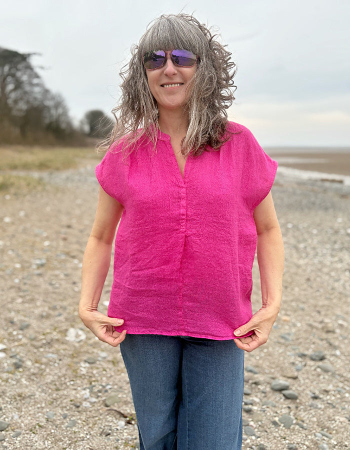 pink v neck linen top with capped sleeves