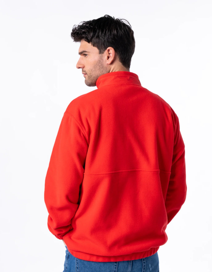 Man wearing a red jacket on a white background