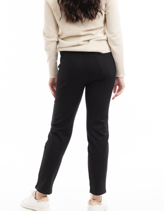 lady wearing black stretch straight leg pull on trousers