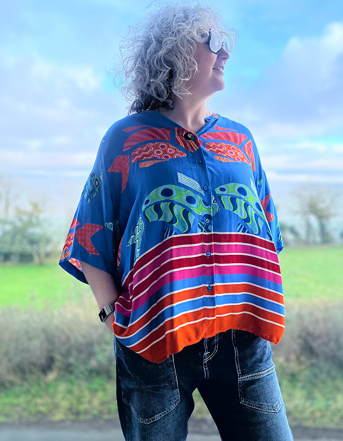 oversized viscose summer shirt with elbow length sleeves and simple round collar with hot colours and an abstract fish print