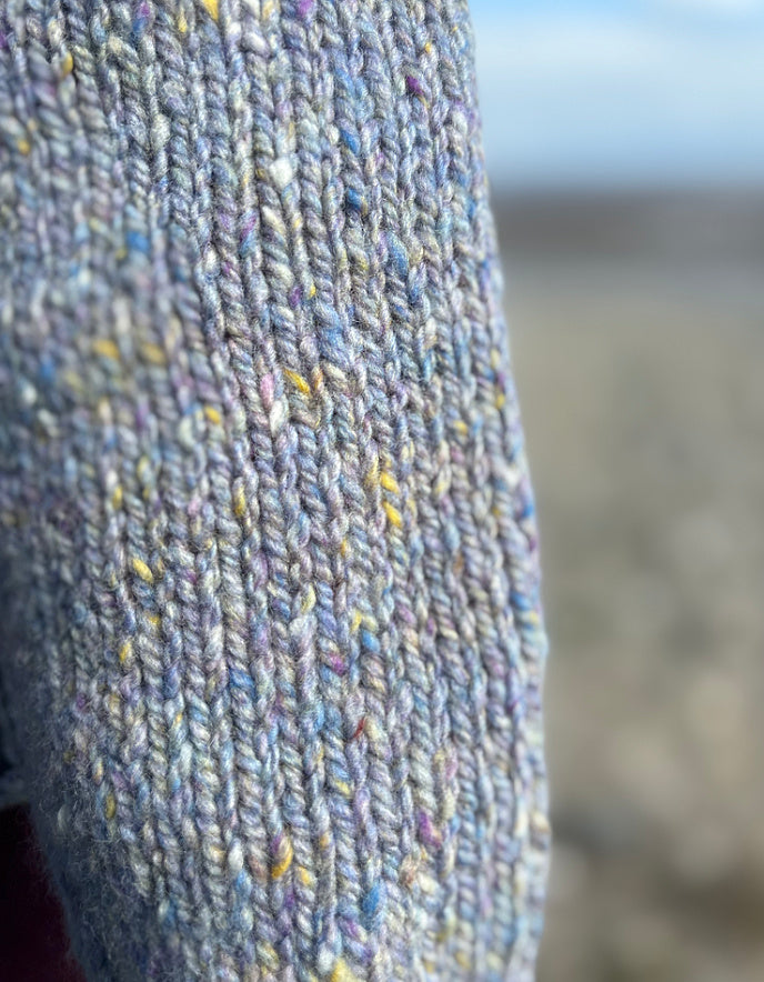 Close-up of textured fabric with a blurred background