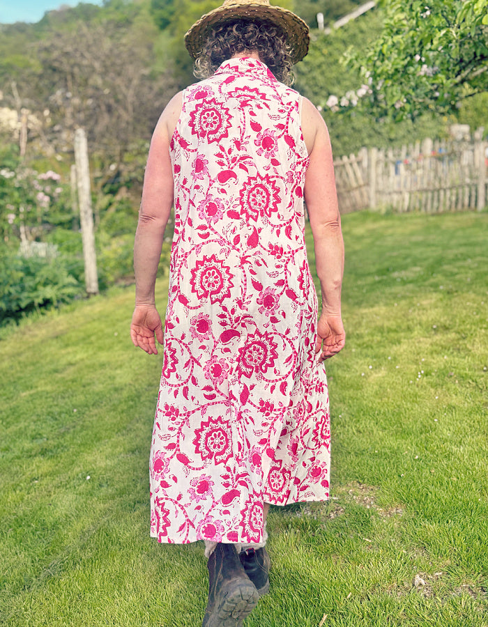 safari style sleeveless shirt dress with a midi length in summer pink print, gorgeous for a summers day