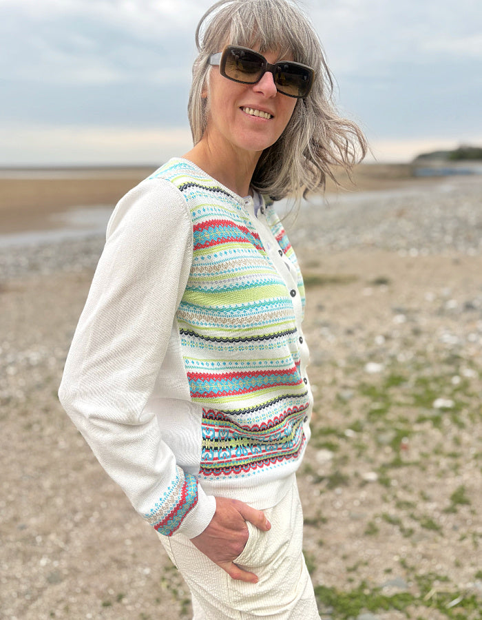 white summer cotton cardigan with fair isle design on the front in pastel bright shades