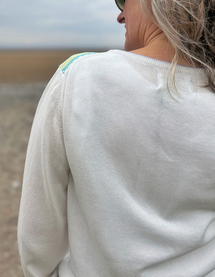 white summer cotton cardigan with fair isle design on the front in pastel bright shades