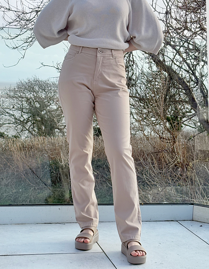 sandy coloured neutral cotton straight leg trouser with 5 pockets and button fly closure