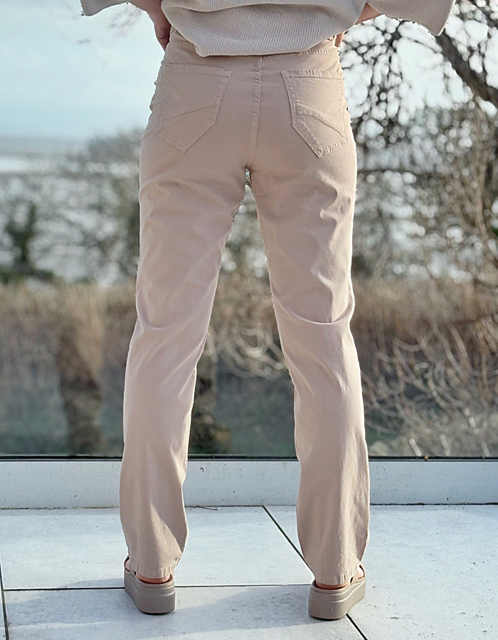 sandy coloured neutral cotton straight leg trouser with 5 pockets and button fly closure
