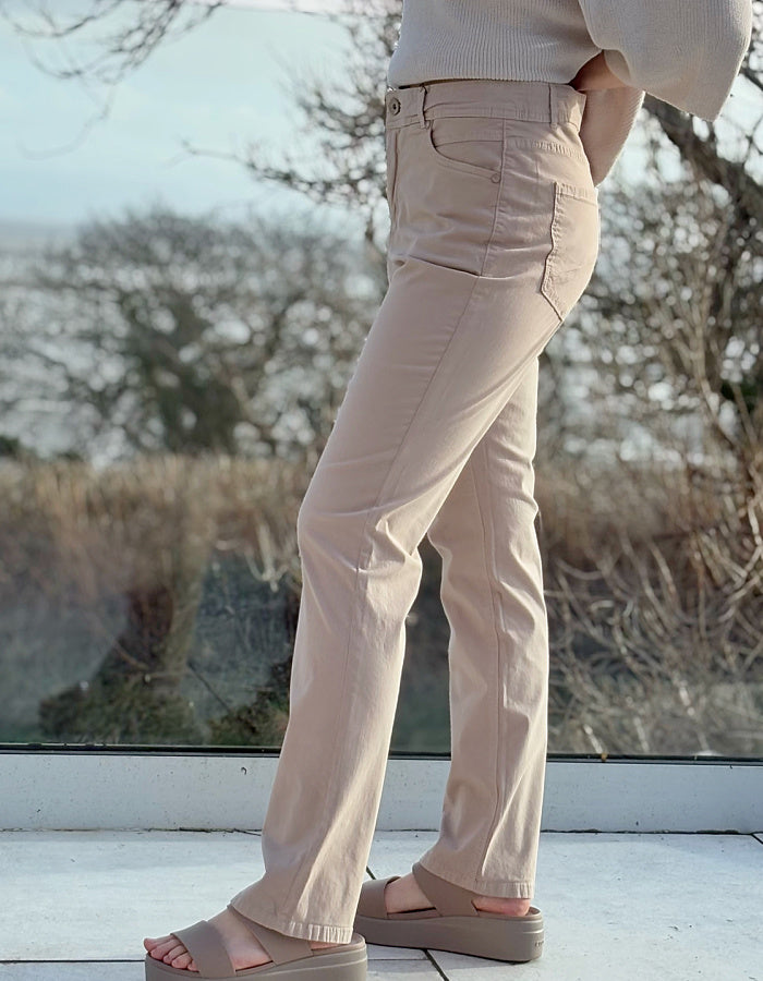 sandy coloured neutral cotton straight leg trouser with 5 pockets and button fly closure