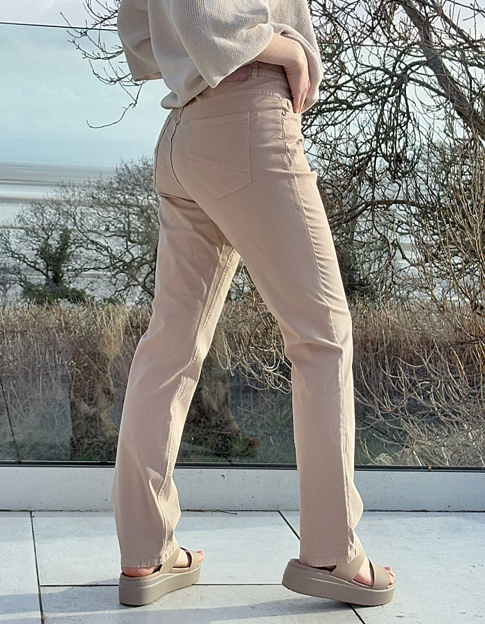 sandy coloured neutral cotton straight leg trouser with 5 pockets and button fly closure