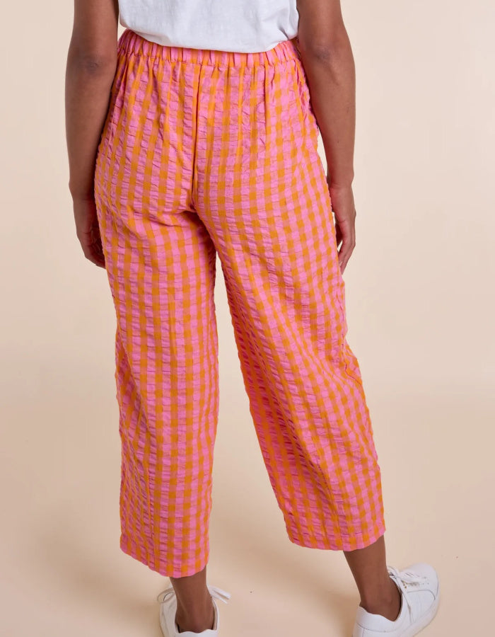 pink and orange lantern shaped cotton summer trousers with elasticated waist and pockets