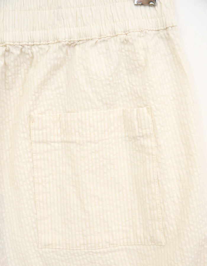 cream seersucker tapered leg trousers with elasticated waist