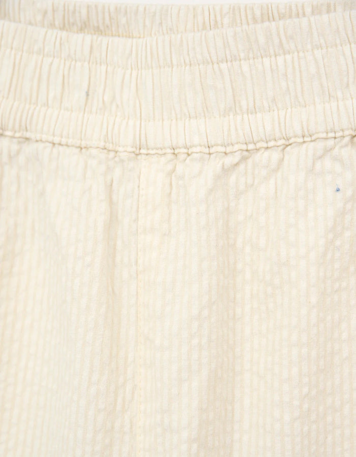 cream seersucker tapered leg trousers with elasticated waist
