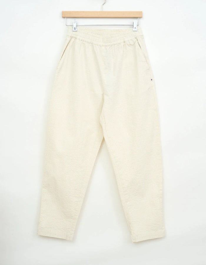 cream seersucker tapered leg trousers with elasticated waist