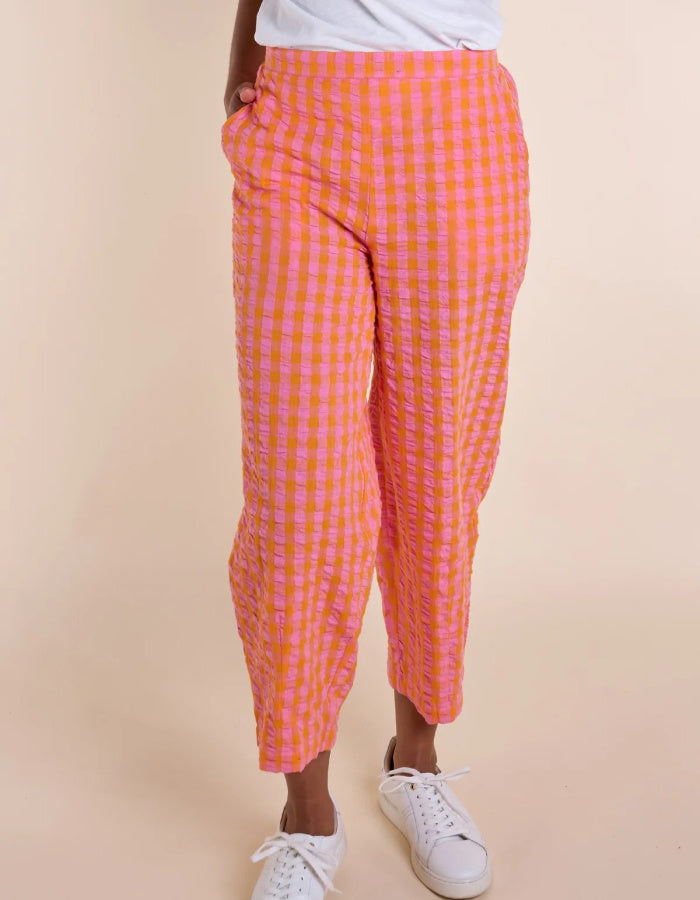 pink and orange lantern shaped cotton summer trousers with elasticated waist and pockets