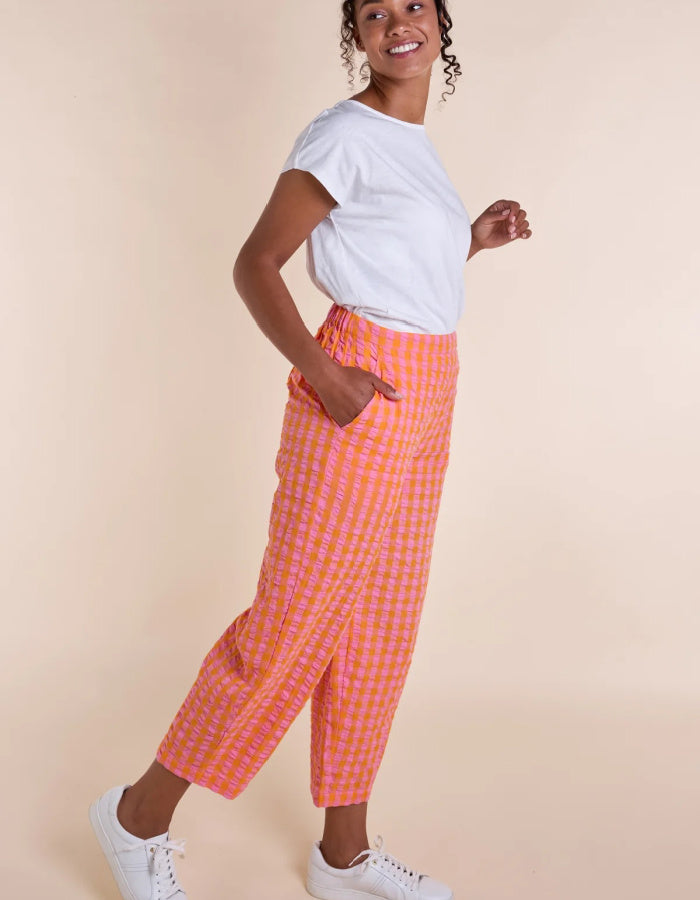 pink and orange lantern shaped cotton summer trousers with elasticated waist and pockets