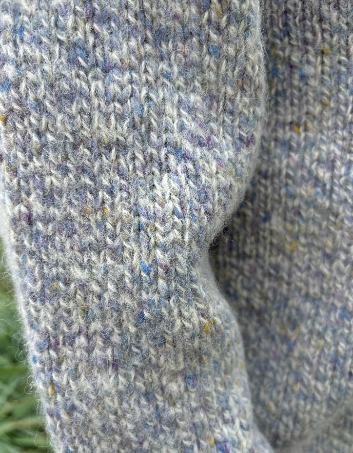 Close-up of textured fabric with a speckled pattern
