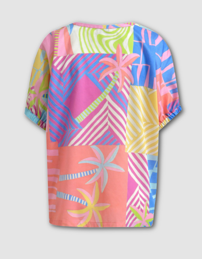 oversized cotton blouse with tropical print inn pastel bright shade