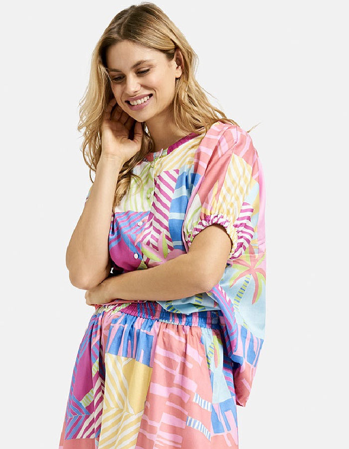 oversized cotton blouse with tropical print inn pastel bright shade