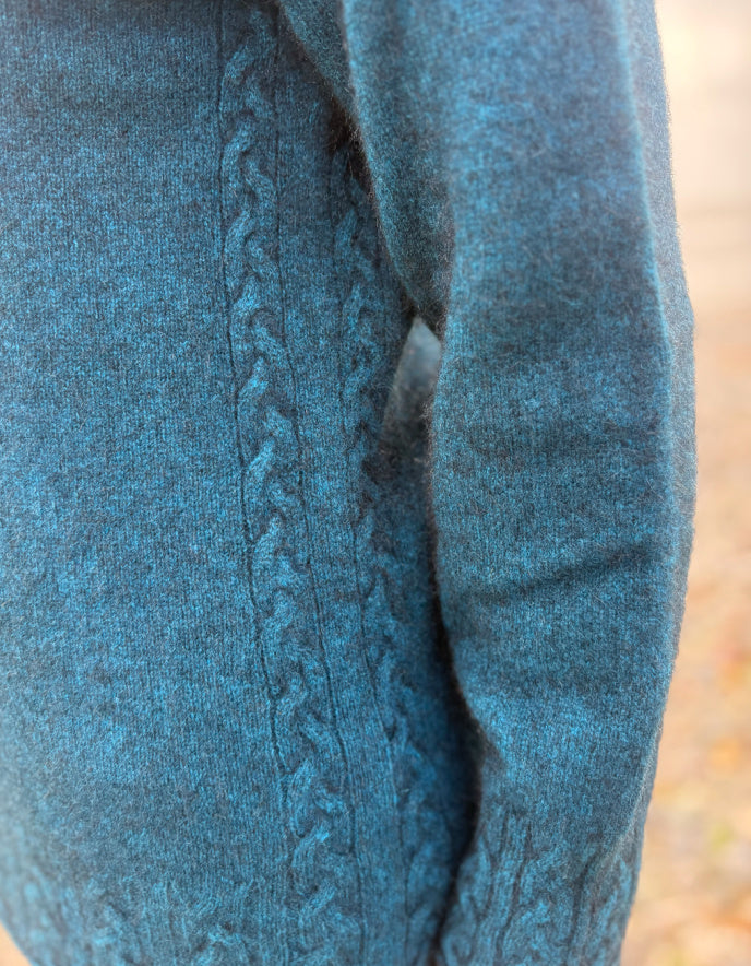 Close-up of a blue textured fabric with a pattern