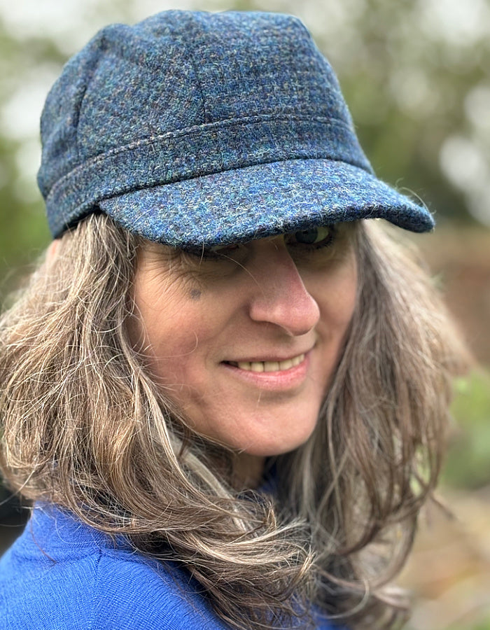 blue Harris Tweed cadet shaped hat with peak