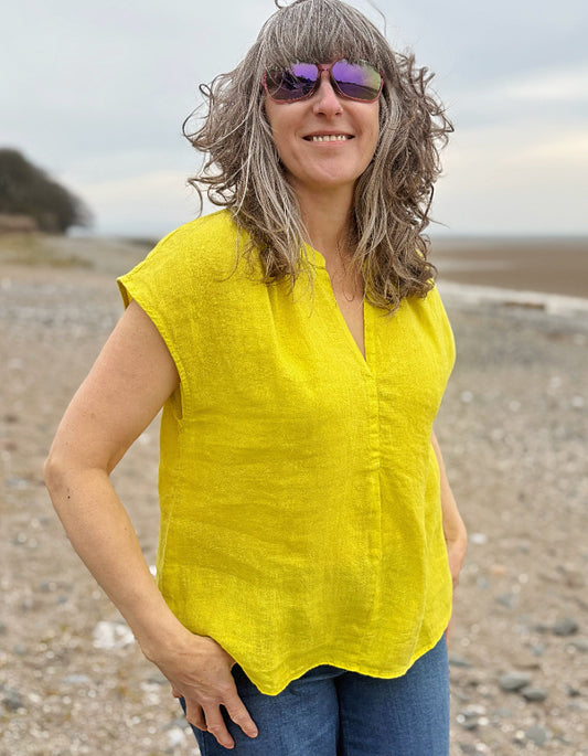 yellow linen v neck top with capped sleeves