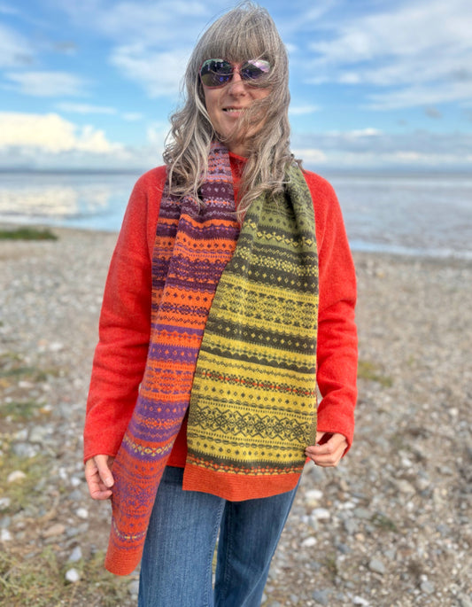 woman wearing fair isle autumn toned wool scarf