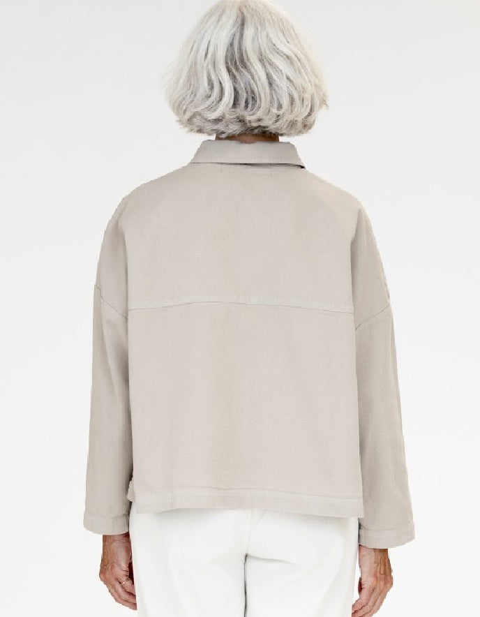 woman wearing a camel cotton canvas workwear inspired  jacket