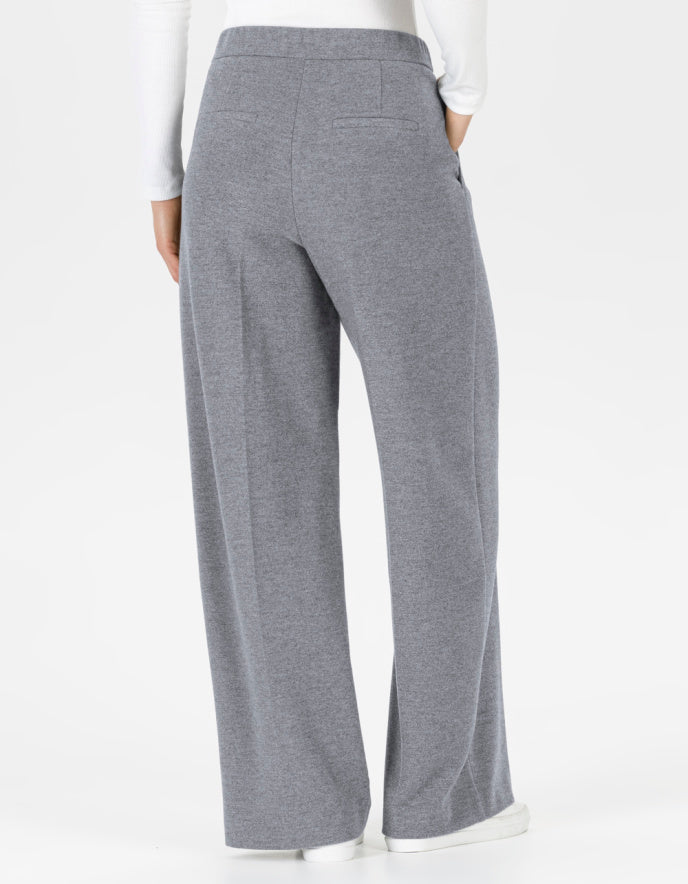 Gray wide-leg pants worn by a person on a white background